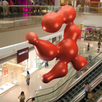 Inflatable sculpture depicting the first character from 又一城 (Festival Walk)